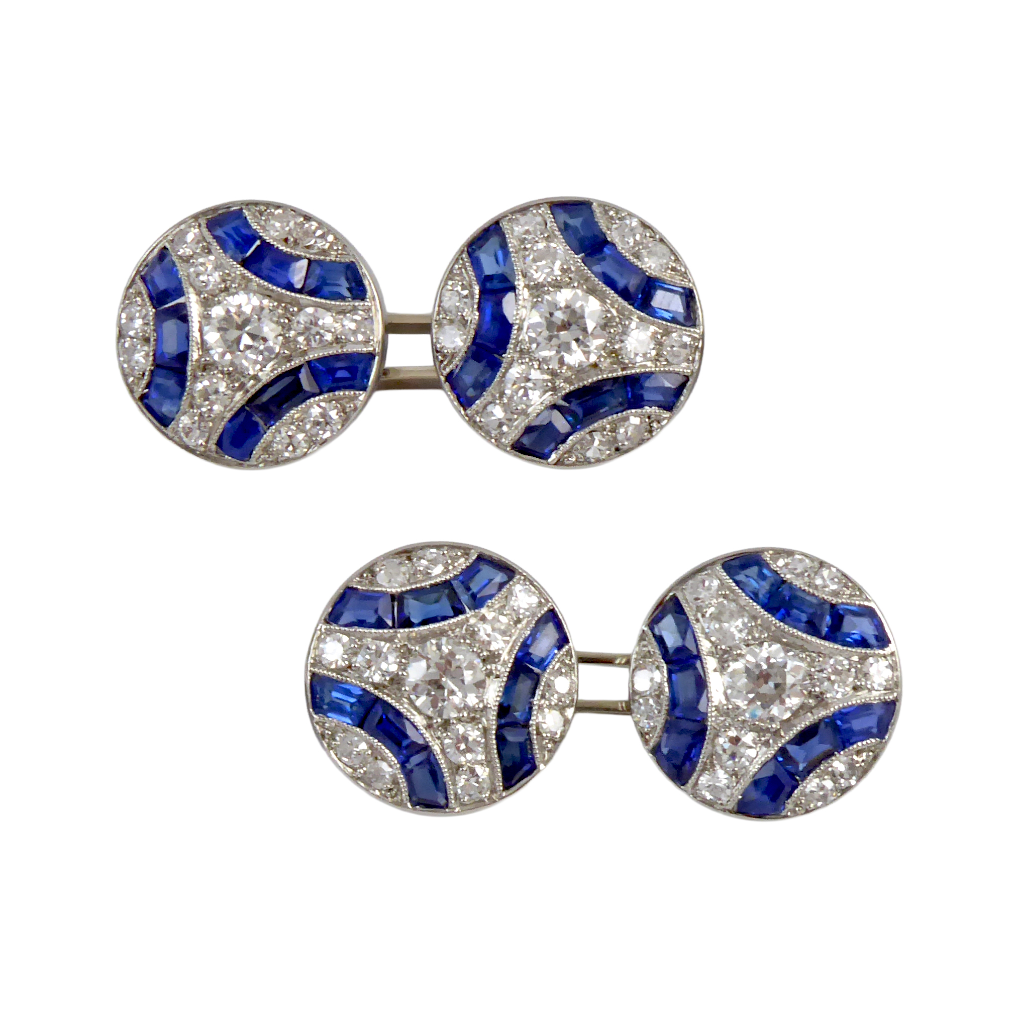 Pair of mid-20th century sapphire and diamond round panel cufflinks, French c.1950,